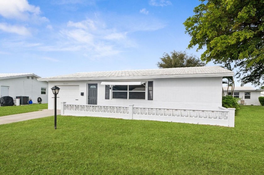 WOW!!!! Totally remodeled single family home in well established - Beach Home for sale in Boynton Beach, Florida on Beachhouse.com