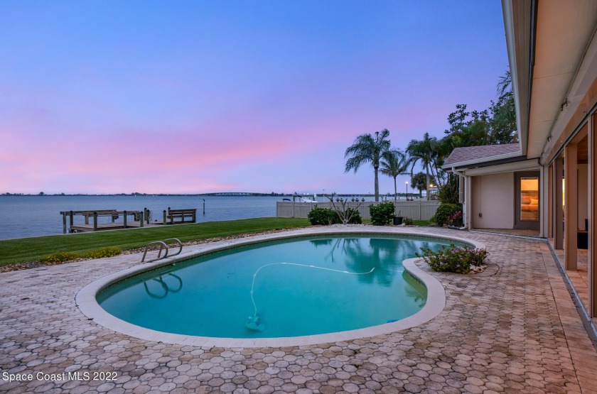 Relish in the iconic Florida lifestyle in this sprawling Indian - Beach Home for sale in Merritt Island, Florida on Beachhouse.com