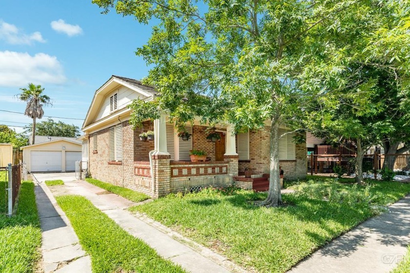 Welcome to this charming 1935 brick bungalow with all the - Beach Home for sale in Galveston, Texas on Beachhouse.com