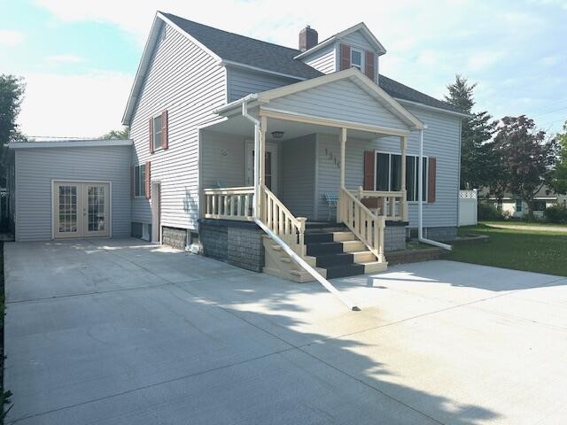 This spacious city home, originally built in 1925, offers - Beach Home for sale in Alpena, Michigan on Beachhouse.com