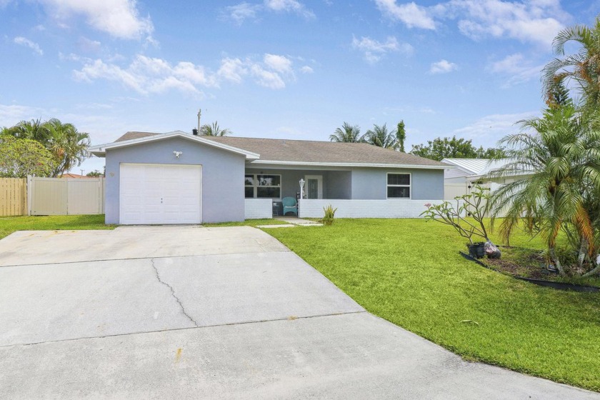 Lovely 4-bedroom, 3-bathroom, 1-car garage, CBS home boasting - Beach Home for sale in Palm Beach Gardens, Florida on Beachhouse.com