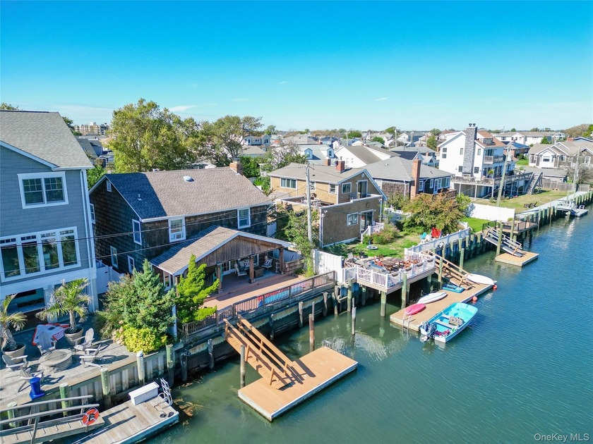This beautiful Colonial home on the water features 4 bedrooms - Beach Home for sale in Long Beach, New York on Beachhouse.com