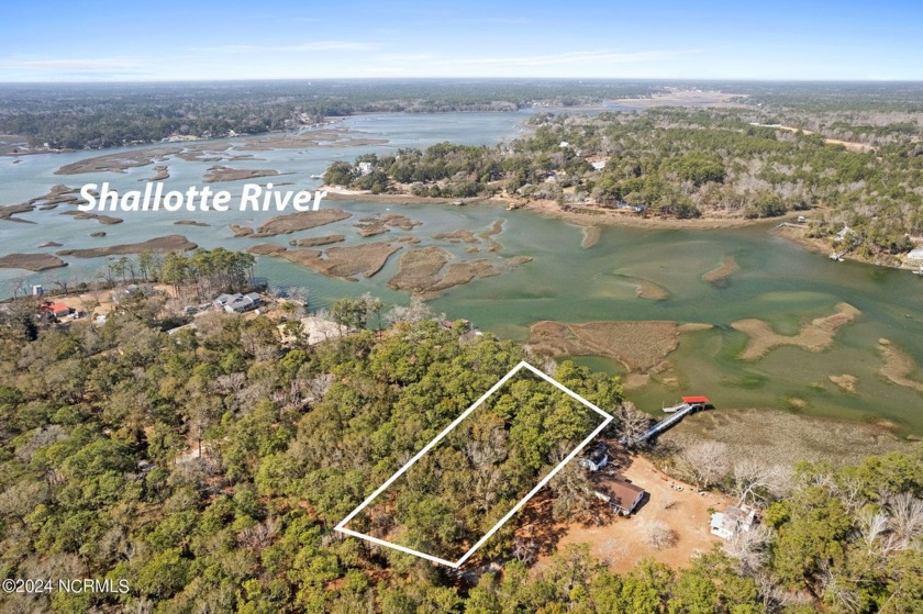 Embrace the tranquil beauty of the Shallotte River with this 1 - Beach Lot for sale in Supply, North Carolina on Beachhouse.com