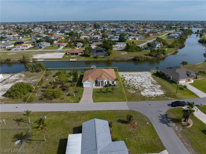 INCREDIBLE chance to own 0.46-acre FRESHWATER FRONT HOME nestled - Beach Home for sale in Cape Coral, Florida on Beachhouse.com