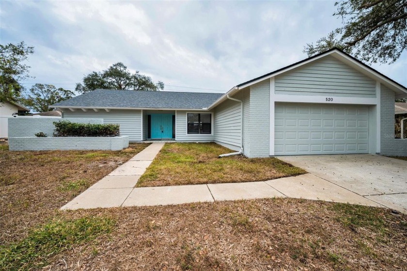 Welcome to your dream home! this magnificent three-bedroom, two- - Beach Home for sale in Palm Harbor, Florida on Beachhouse.com