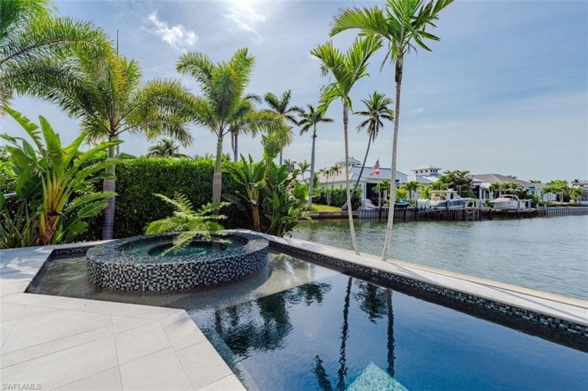 Experience the epitome of luxurious coastal living in the highly - Beach Home for sale in Naples, Florida on Beachhouse.com