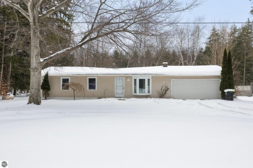 Situated along US-31 in Kewadin, this 3-bed, 1-bath property - Beach Home for sale in Kewadin, Michigan on Beachhouse.com