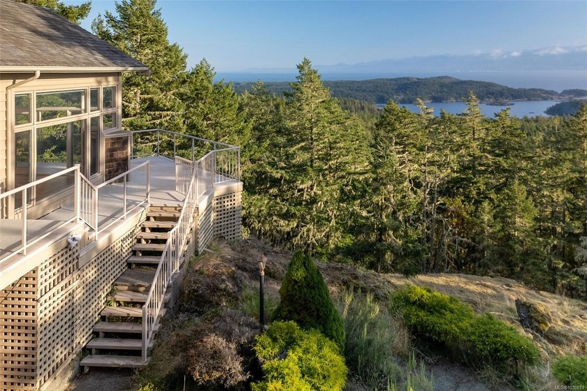 Perched atop Mount Matheson, this custom-built, architecturally - Beach Home for sale in Sooke, British Columbia on Beachhouse.com