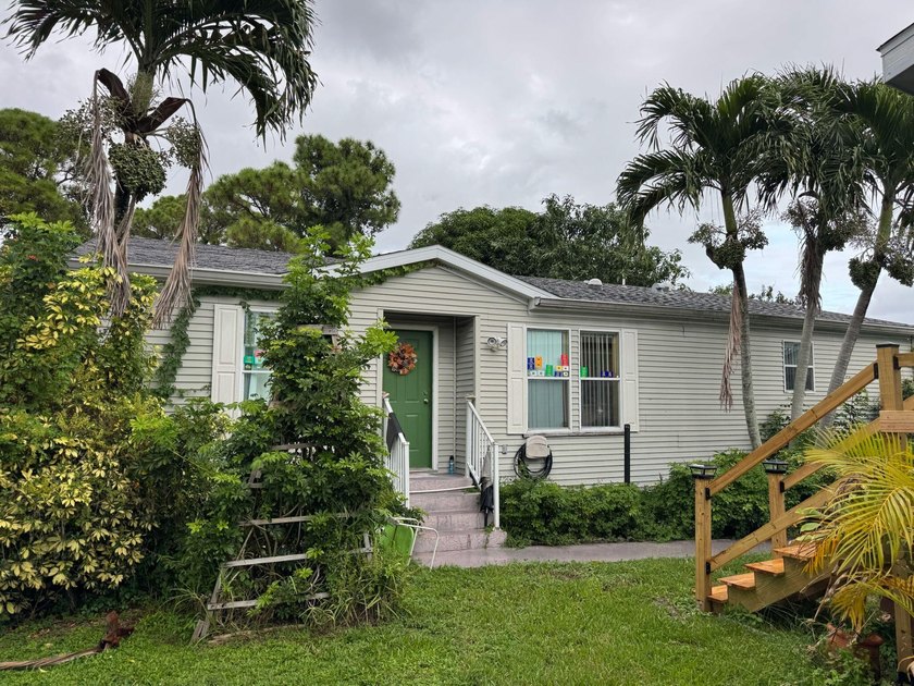 Charming mobile home featuring 3 bedrooms, 2 bathrooms, All age - Beach Home for sale in Palm Beach Gardens, Florida on Beachhouse.com