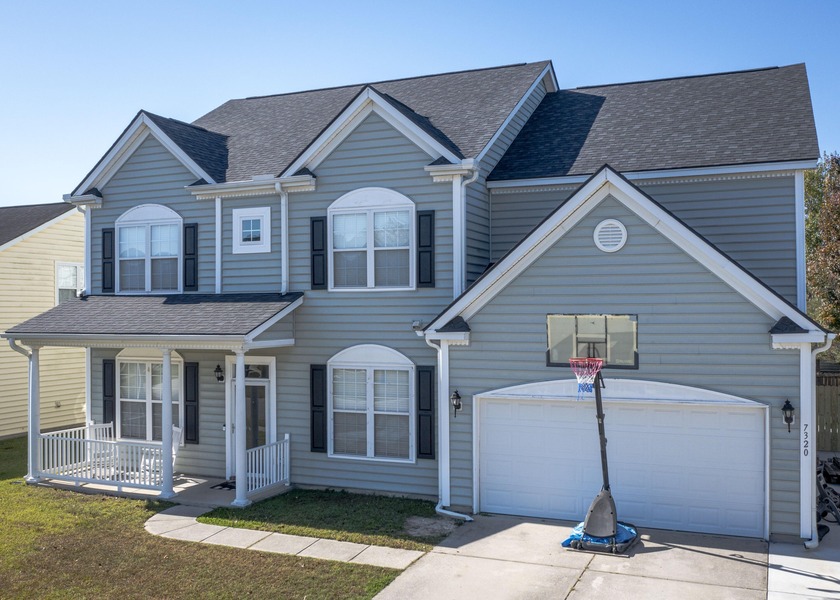 Step inside this beautifully updated home featuring luxury vinyl - Beach Home for sale in Hanahan, South Carolina on Beachhouse.com