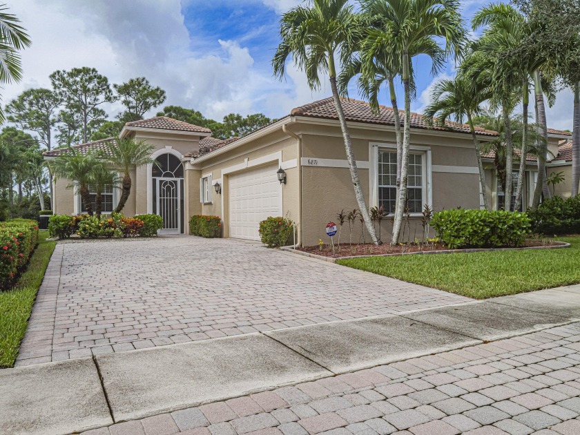 This exceptional 3-bedroom, 2-bathroom screened Pool home with - Beach Home for sale in Stuart, Florida on Beachhouse.com