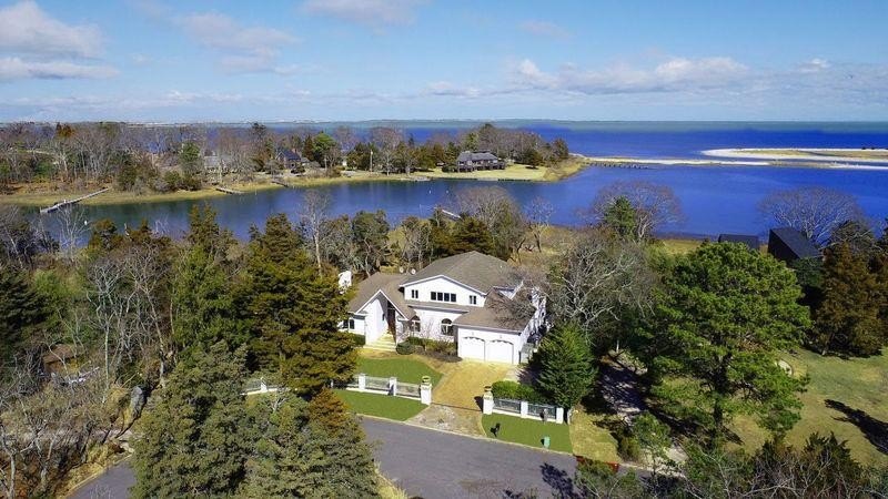 This stunning waterfront home in Hampton Bays offers an - Beach Home for sale in Hampton Bays, New York on Beachhouse.com