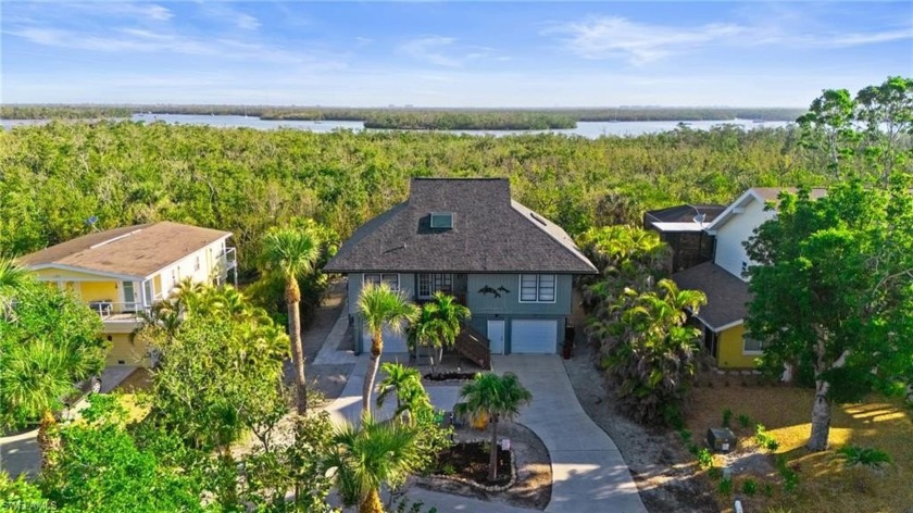Welcome to your dream coastal retreat! Conveniently located - Beach Home for sale in Fort Myers Beach, Florida on Beachhouse.com