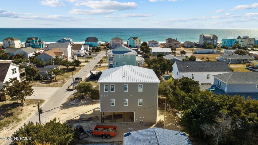 This beautiful 3 story new construction is only a few weeks away - Beach Home for sale in Emerald Isle, North Carolina on Beachhouse.com