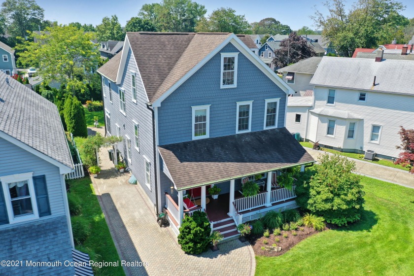 Discover the perfect blend of coastal and modern in this Spring - Beach Home for sale in Spring Lake, New Jersey on Beachhouse.com