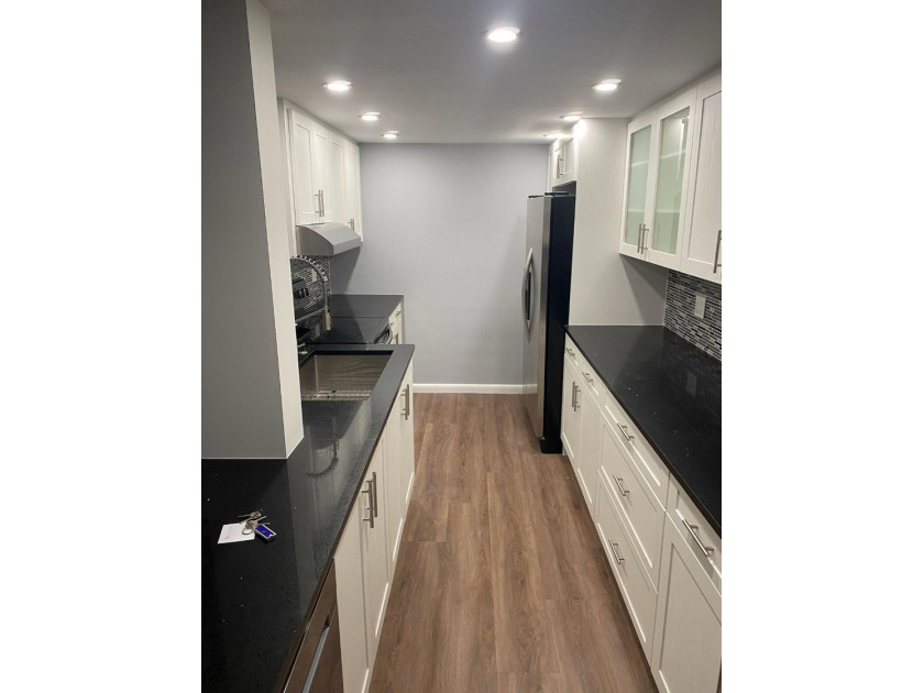 This spacious 2-bedroom, 2-bathroom unit features an open living - Beach Condo for sale in Lauderhill, Florida on Beachhouse.com