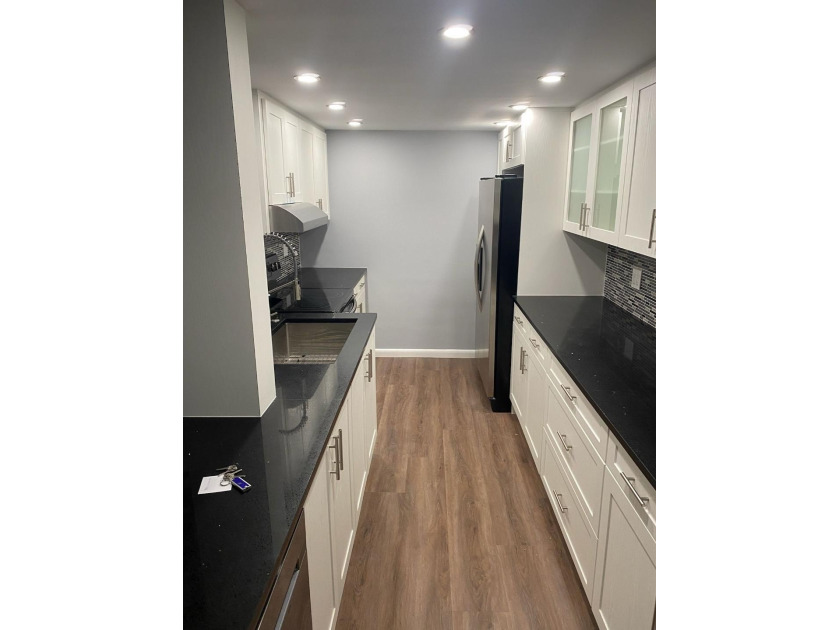 This spacious 2-bedroom, 2-bathroom unit features an open living - Beach Condo for sale in Lauderhill, Florida on Beachhouse.com