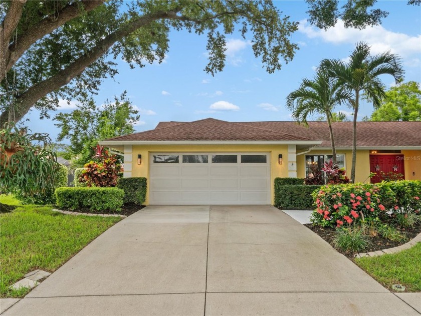 Experience breathtaking front and back lake views from this - Beach Home for sale in Sarasota, Florida on Beachhouse.com