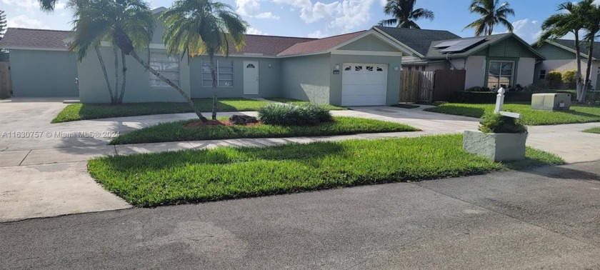 This charming single-family home offers a perfect blend of - Beach Home for sale in Miami, Florida on Beachhouse.com