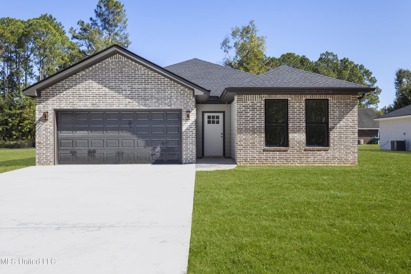 NEW PRICE + $2,000 BUYER CREDIT!! Enjoy coastal living in this - Beach Home for sale in Gautier, Mississippi on Beachhouse.com