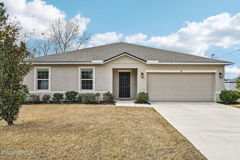 Step inside and you'll feel it right away--this is a home that's - Beach Home for sale in Palm Coast, Florida on Beachhouse.com