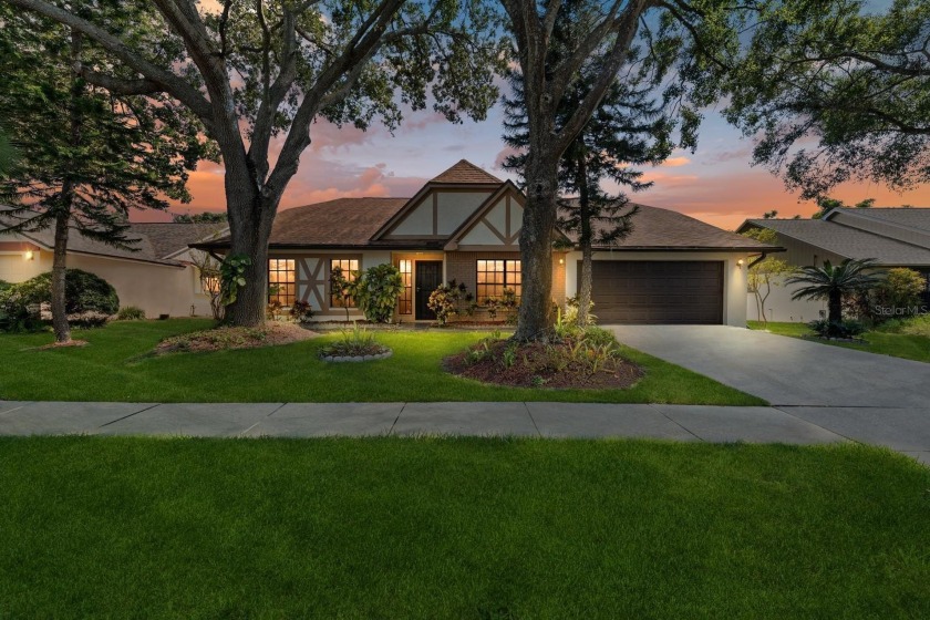 Welcome to this charming 4-bedroom, 2-bathroom Tudor Style Ranch - Beach Home for sale in Tampa, Florida on Beachhouse.com