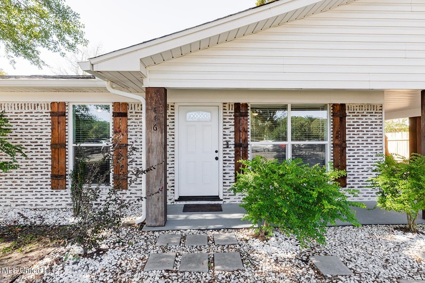 This exquisite 4-bedroom, 2.5-bath property showcases two - Beach Home for sale in Ocean Springs, Mississippi on Beachhouse.com