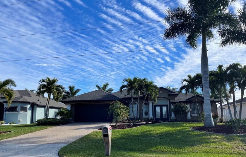 Picturesque waterfront Gulf access pool home with concrete dock - Beach Home for sale in Port Charlotte, Florida on Beachhouse.com