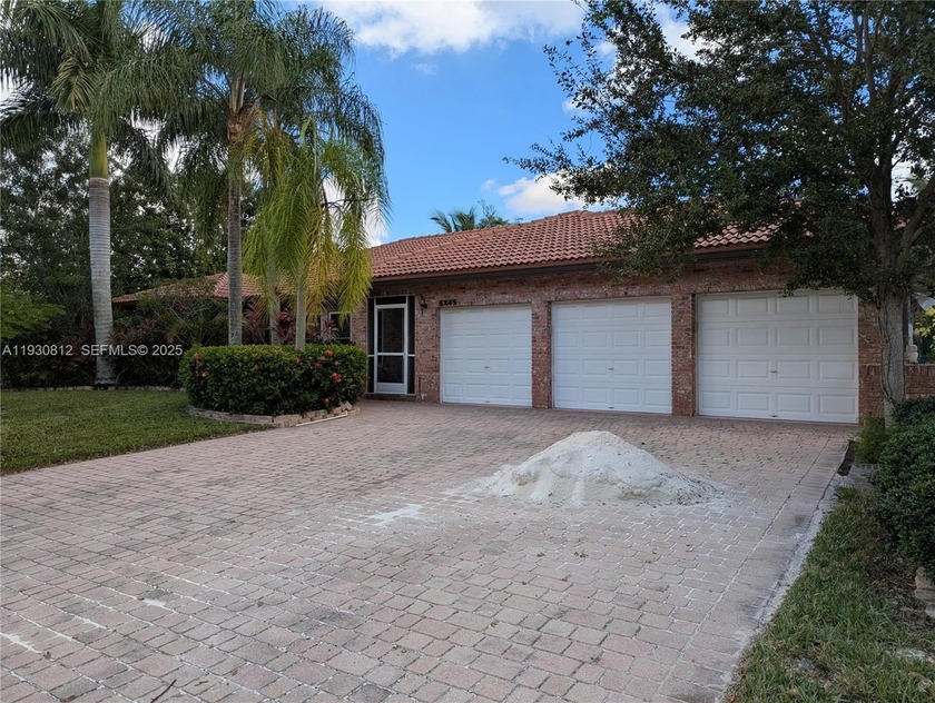 Private Waterfront Oasis: Rare Ranch Home With Wildlife Preserve - Beach Home for sale in Coral Springs, Florida on Beachhouse.com