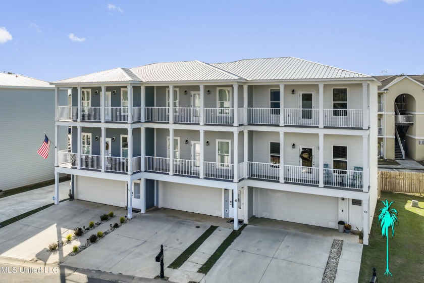 Take a Look at this beautiful, spacious three-level  Beach - Beach Townhome/Townhouse for sale in Long Beach, Mississippi on Beachhouse.com