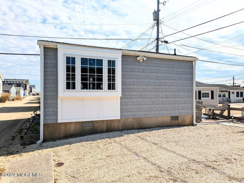 This adorable beach cottage is only 8 houses from the ocean and - Beach Home for sale in Lavallette, New Jersey on Beachhouse.com