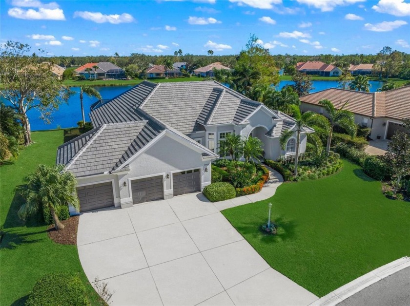 Nestled within the prestigious gated Lakewood Ranch Country Club - Beach Home for sale in Lakewood Ranch, Florida on Beachhouse.com