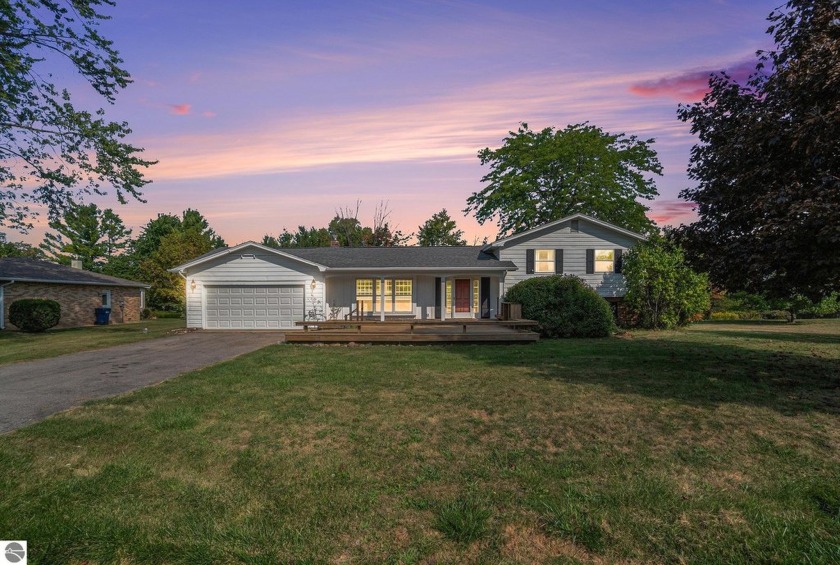 PRIVATE FRONTAGE! Retro Waterfront Gem. Discover Your Own Slice - Beach Home for sale in Traverse City, Michigan on Beachhouse.com