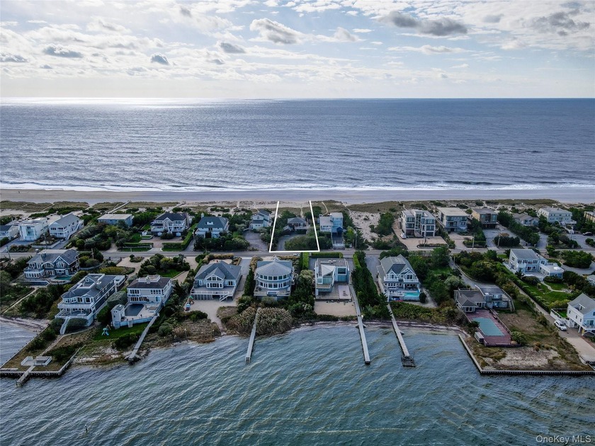 Experience the essence of Hamptons Oceanfront living in this - Beach Home for sale in Westhampton, New York on Beachhouse.com