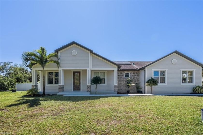 Pool home with Adorable Farmhouse theme. The pool has a built in - Beach Home for sale in Naples, Florida on Beachhouse.com
