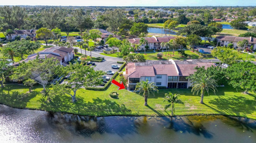 Enjoy stunning lake views from this bright first-floor corner - Beach Condo for sale in Boca Raton, Florida on Beachhouse.com