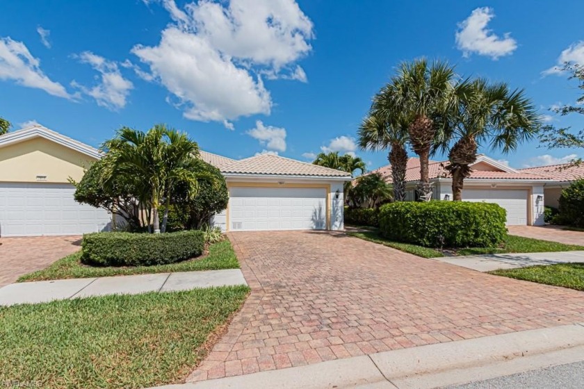 Nestled within the sought-after community of Verona Walk, this - Beach Home for sale in Naples, Florida on Beachhouse.com