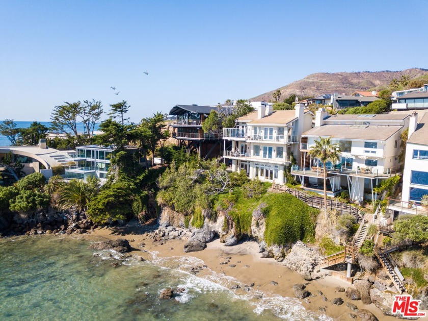 A true oceanfront retreat in the coveted gated community of - Beach Home for sale in Malibu, California on Beachhouse.com