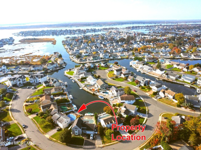 THIS 4 BEDROOM TWO AND A HALF BATH WATERFRONT HOME IN THE - Beach Home for sale in Point Pleasant, New Jersey on Beachhouse.com