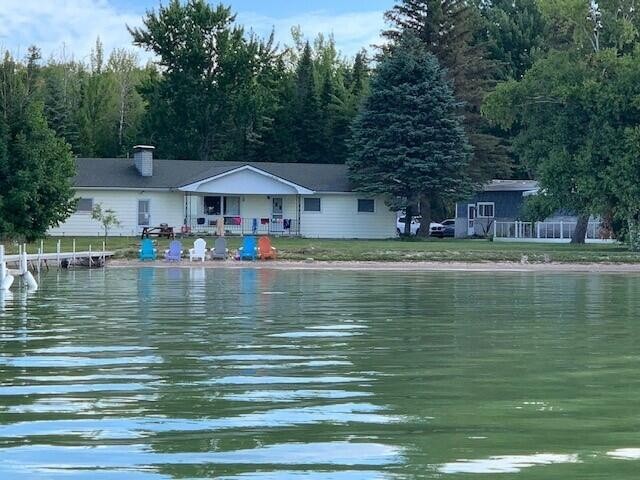 Enjoy one of the nicest beaches on Mullett Lake, Sand as far as - Beach Home for sale in Cheboygan, Michigan on Beachhouse.com