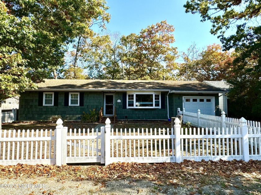 Barnegat Pines Ranch across from the lake. 3 Beds 2 Baths with a - Beach Home for sale in Forked River, New Jersey on Beachhouse.com