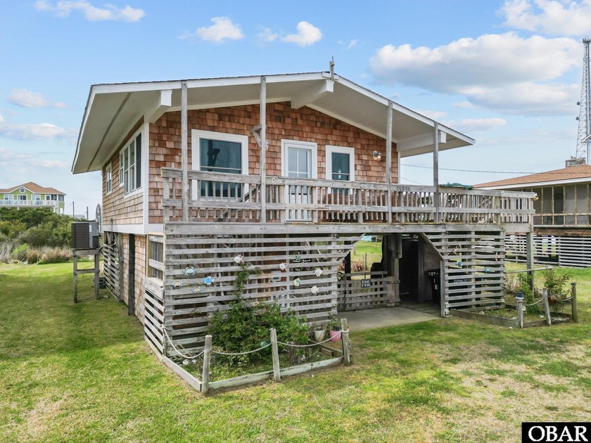 Coastal. Elegant. Modern. This charming 2BD/2BA 1970's oceanside - Beach Home for sale in Rodanthe, North Carolina on Beachhouse.com