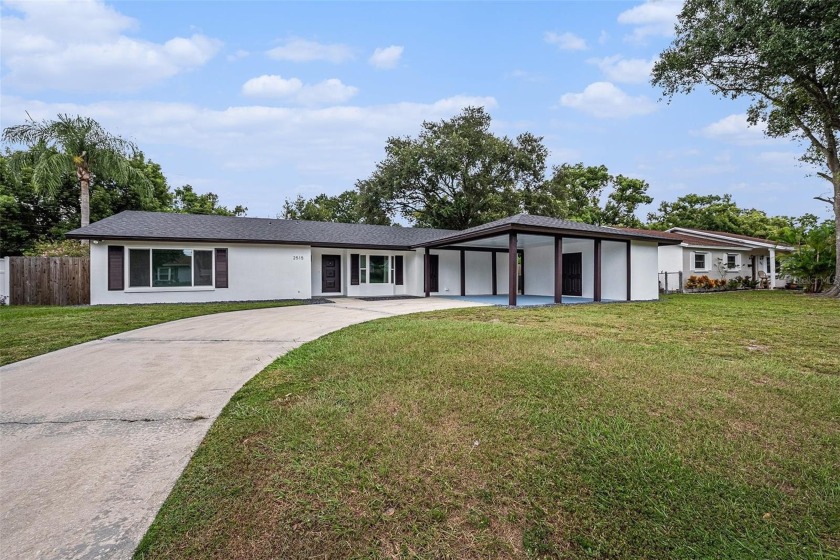 Fully remodeled  with high-end finishes, this stunning residence - Beach Home for sale in Tampa, Florida on Beachhouse.com