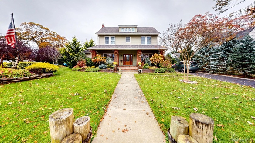 Welcome to This Sanctuary in East Rockaway. A Stately Three - Beach Home for sale in East Rockaway, New York on Beachhouse.com