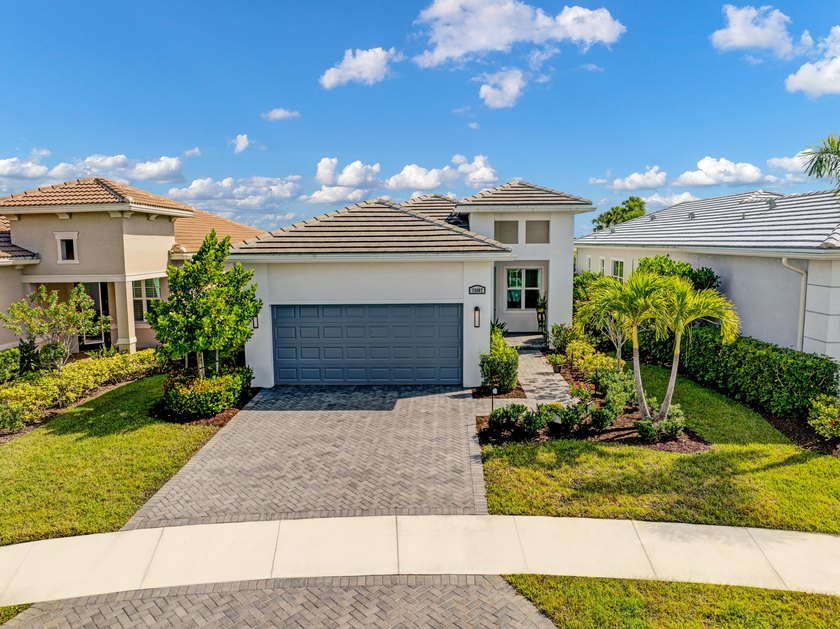 Enjoy lake views from your screened back patio on a quiet culs - Beach Home for sale in Port Saint Lucie, Florida on Beachhouse.com
