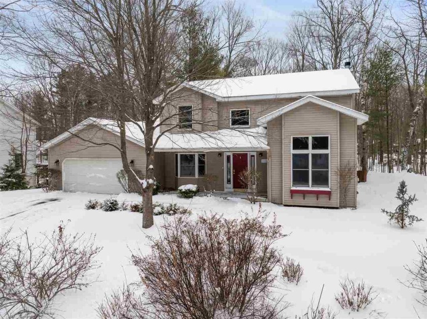 Discover the perfect blend of privacy and convenience in this - Beach Home for sale in Charlevoix, Michigan on Beachhouse.com