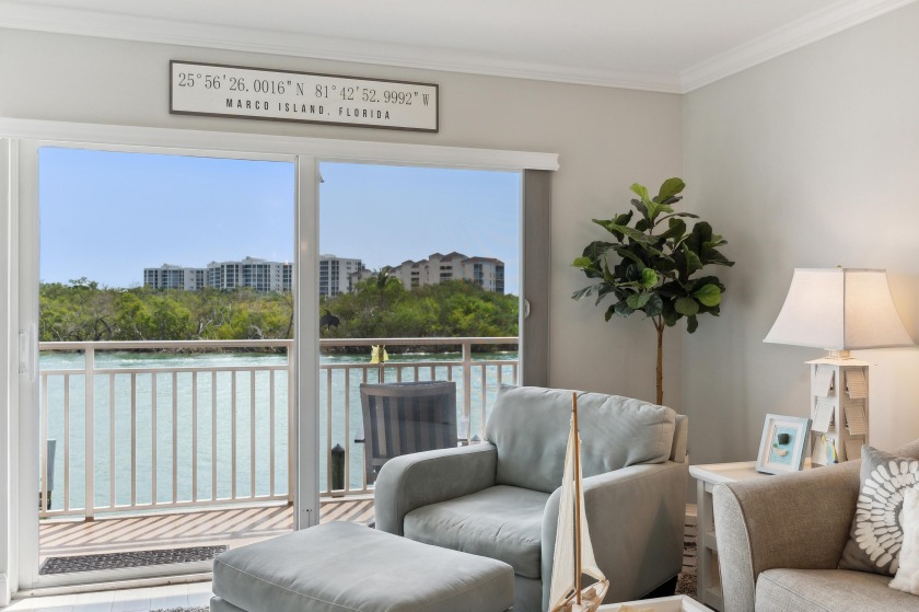 Price INCLUDES boat slip #3 which has a Slidmoor Docking system - Beach Condo for sale in Marco Island, Florida on Beachhouse.com