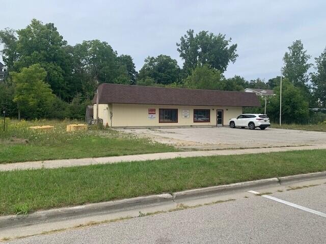 Located in Downtown Montague, in the shadows of White Lake, this - Beach Commercial for sale in Montague, Michigan on Beachhouse.com