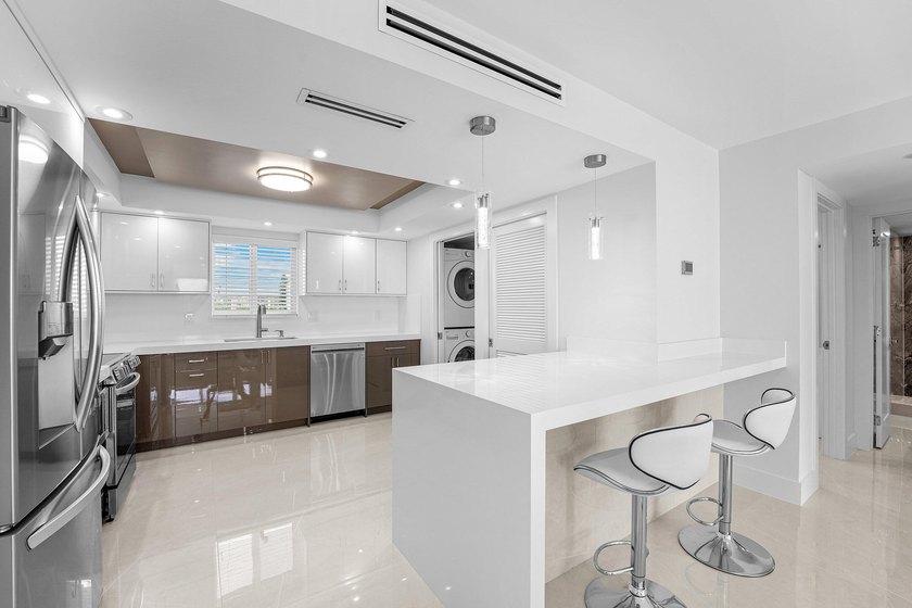 Location, Views, and Brand NEW! Completely renovated with high - Beach Condo for sale in Lake Park, Florida on Beachhouse.com