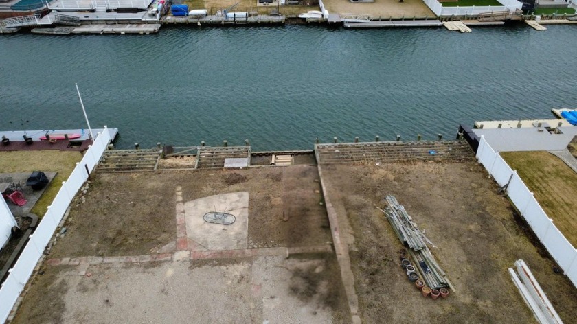 Canal waterfront plot of land for sale just in time to build the - Beach Lot for sale in Massapequa, New York on Beachhouse.com